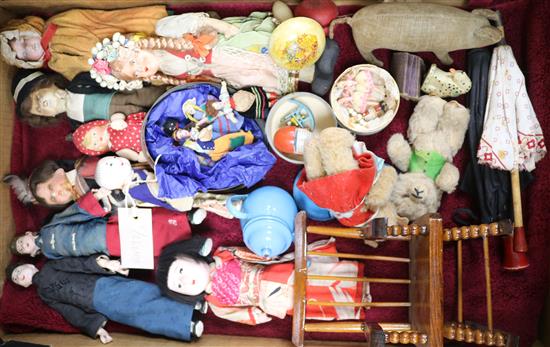 A collection of dolls, toys etc